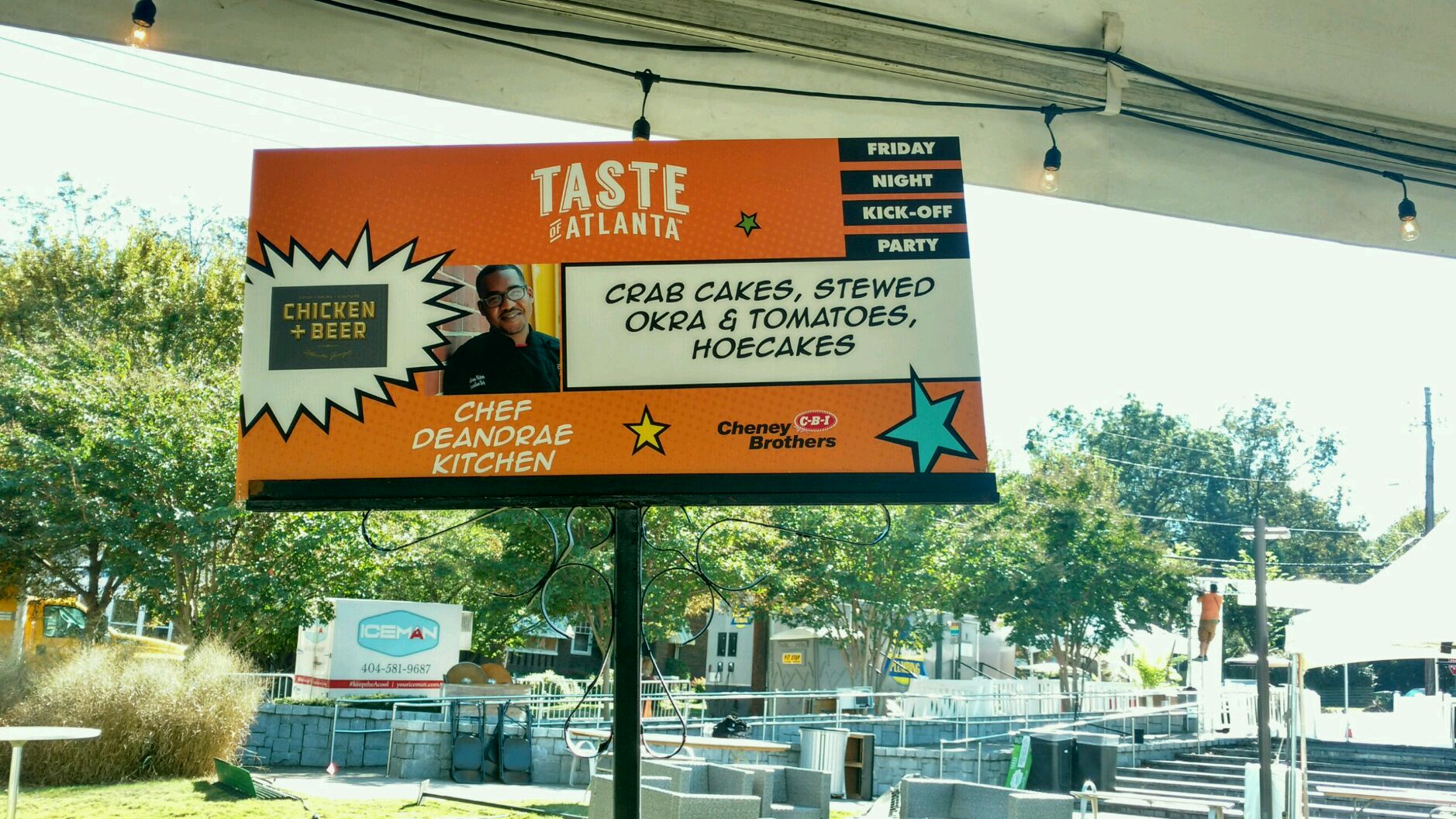 Taste of Atlanta event board featuring Chef Deandrae Kitchen and his crab cake dish